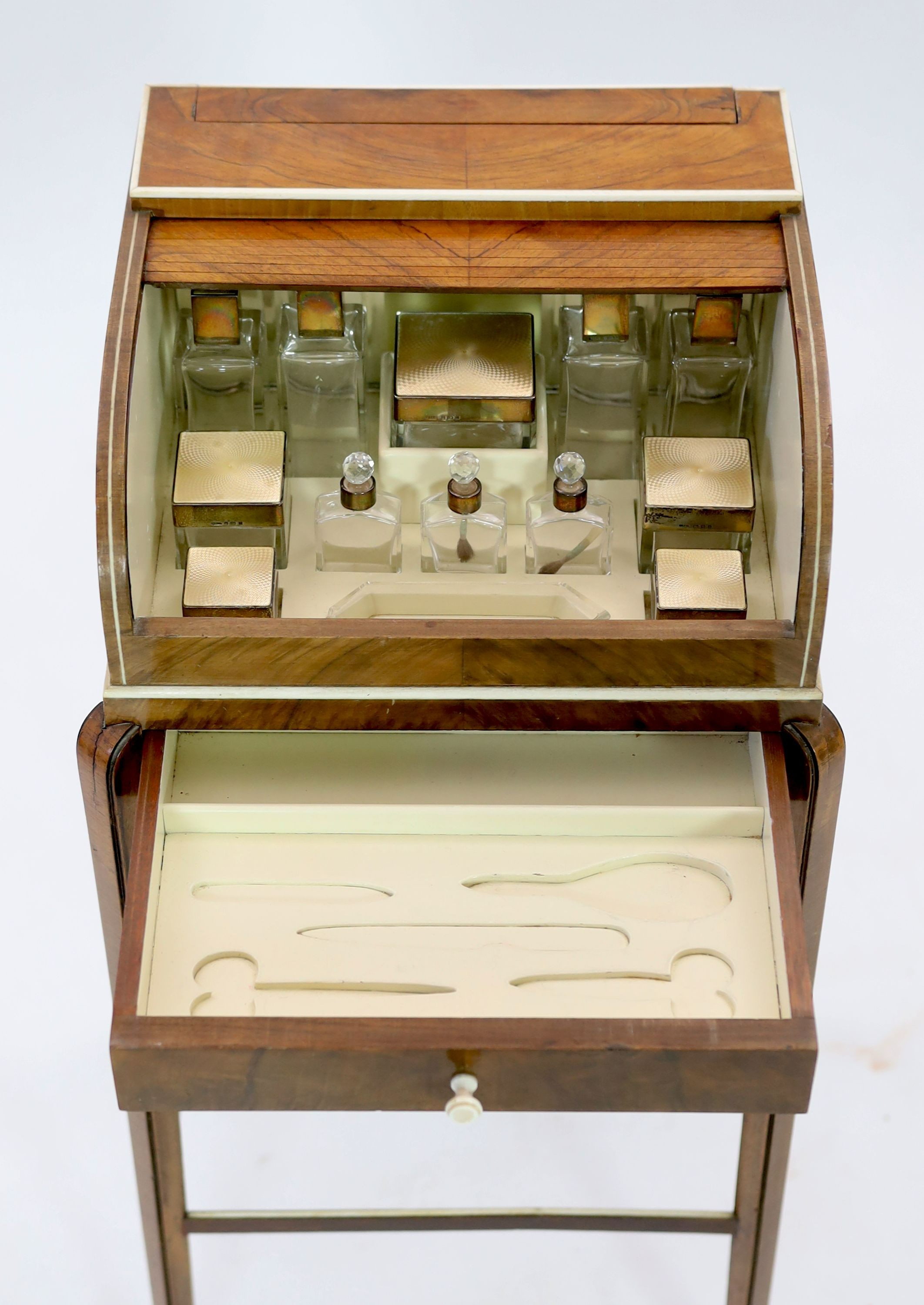 An Art Deco Maple & Co walnut and ivory beaded necessaire poudreuse table, c.1934